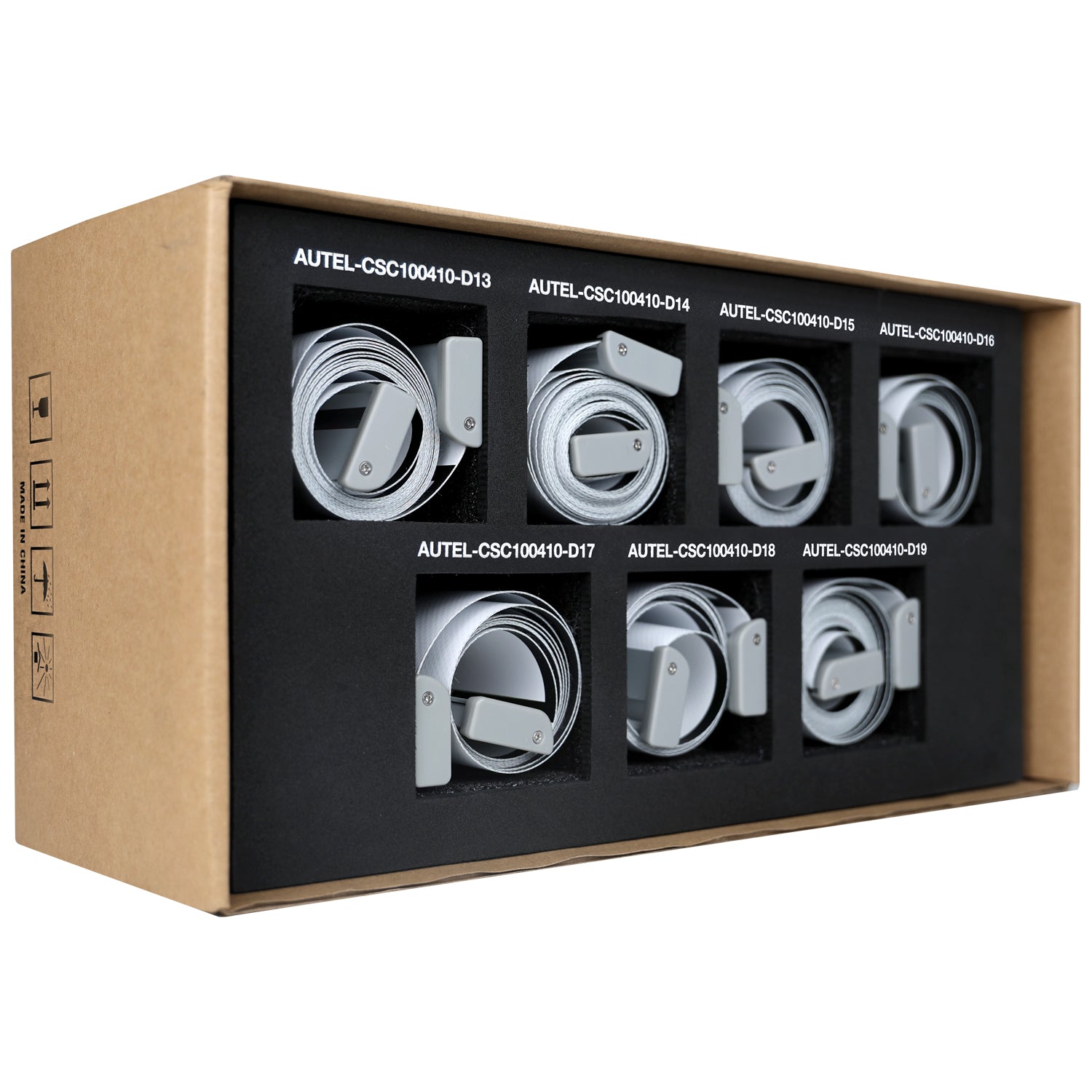 Box with multiple metal components labeled AUTEL on a white background